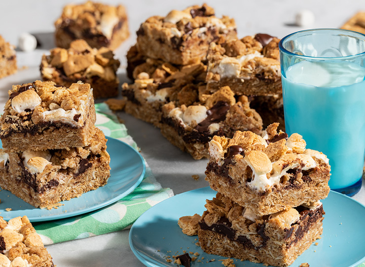 Oatmeal smores bars with a glass of milk