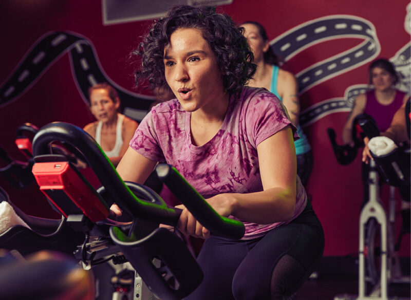 woman on an exercise bike