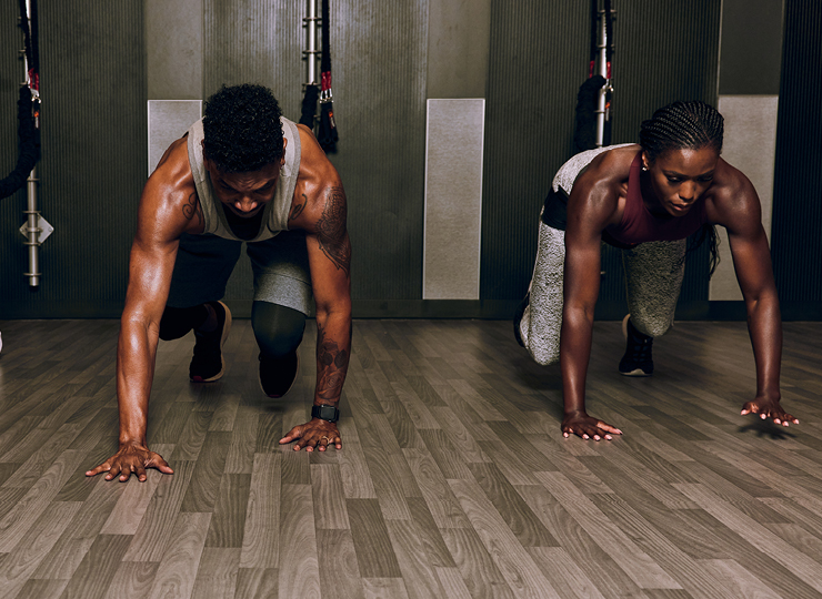 people in all out athlete class at crunch fitness