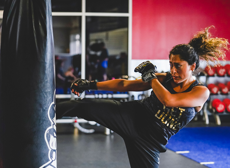 people in badass bootcamp class at crunch fitness