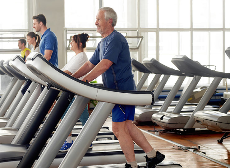 senior walking on a treadmill