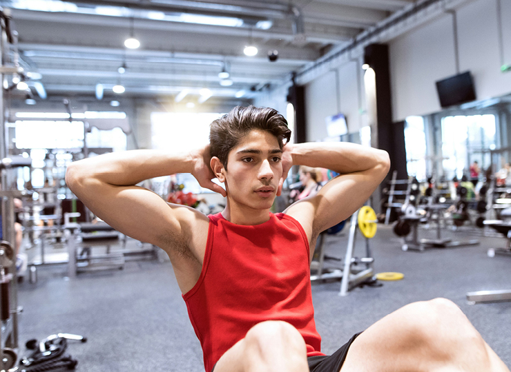 college kid in the gym