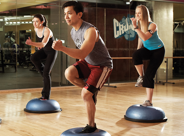 People in bosu fitness class