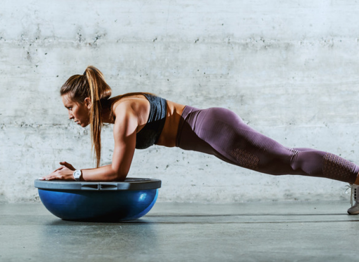 People in bosu fitness class