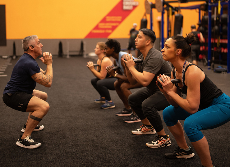 people in heavy metal hiit class at crunch