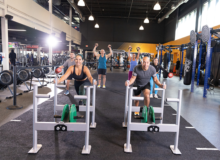 people in heavy metal hiit class at crunch