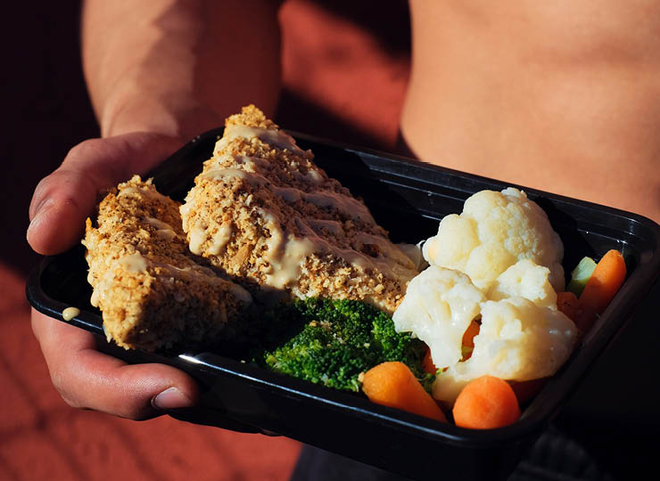 person eating balanced meal portions